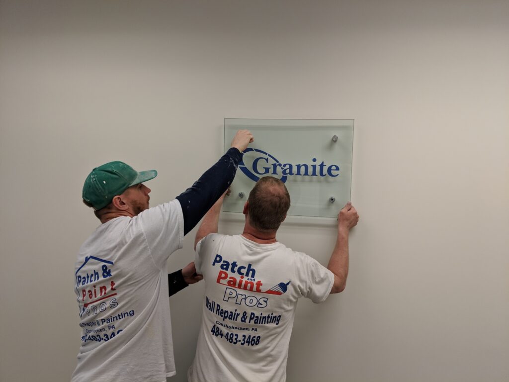 Office Painters local office painters hanging sign